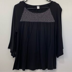 relaxed smocked top for women in color “black jack”